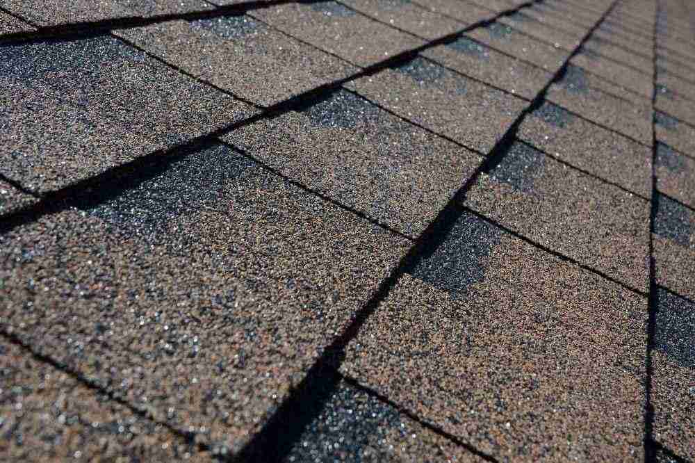 Close-up Asbestos Built-up Roofing Layers, Example of a com…